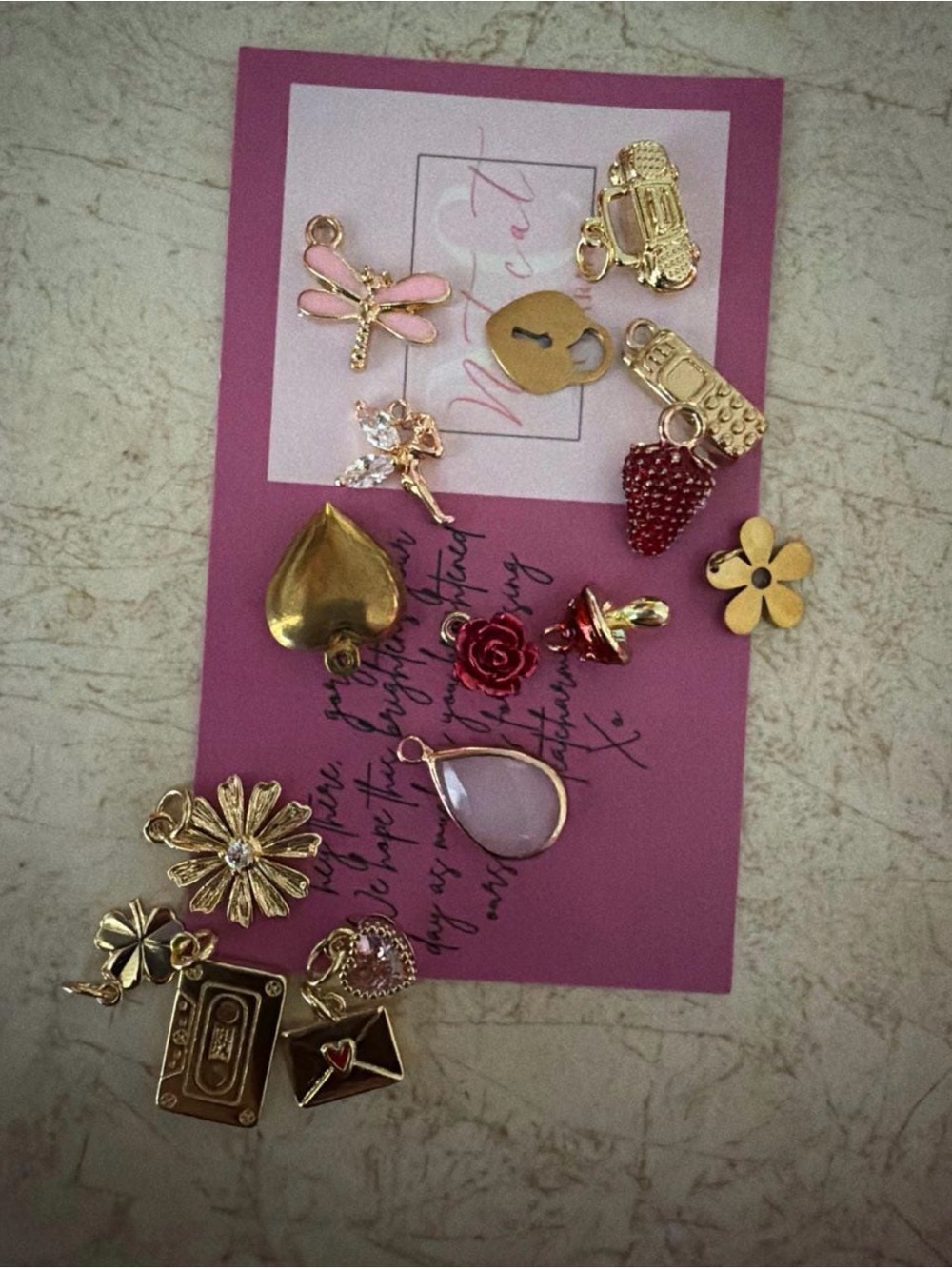 Gold-Tone Mixed Charm Necklace Set with Pink and Red Accents
